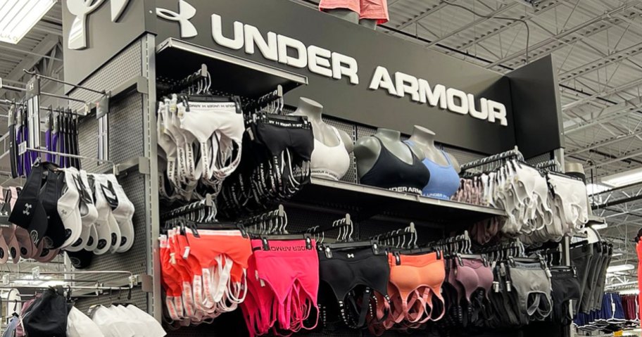 display of under armour sports bras in store