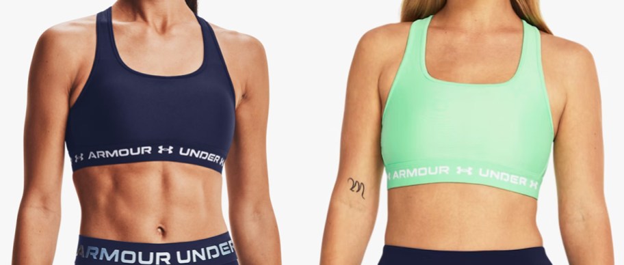 two women in navy blue and green sports bras