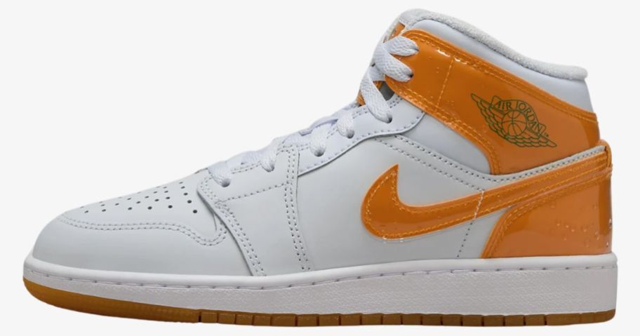 a orange and white mid top sneaker