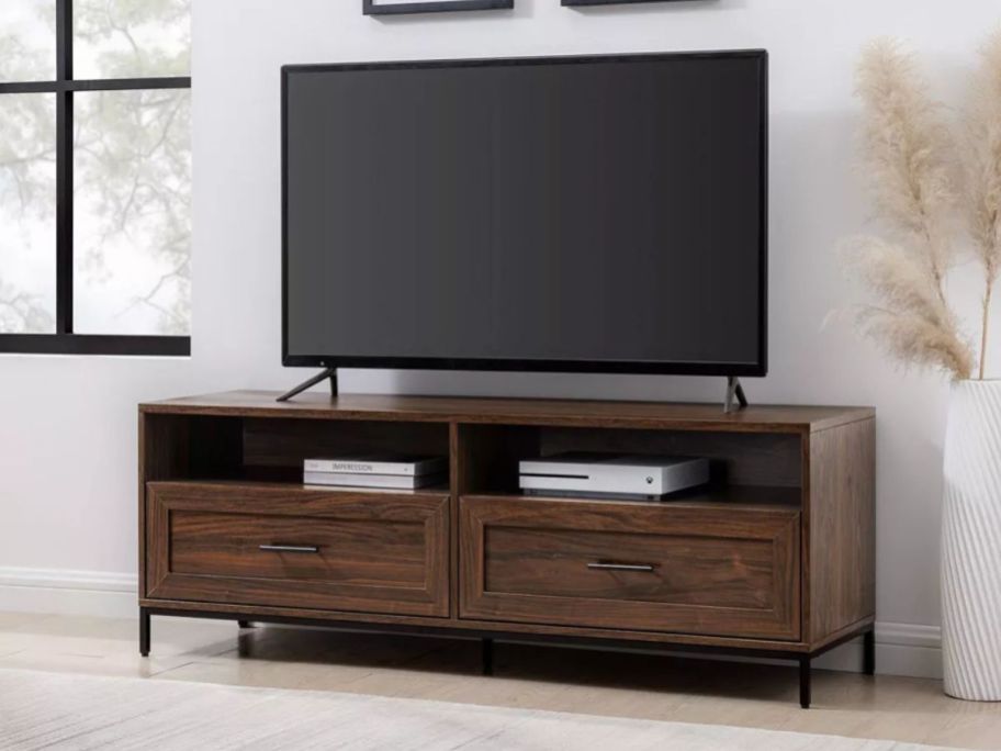 Saracina Home Orin Modern 2-Drawer TV Stand with tv on it