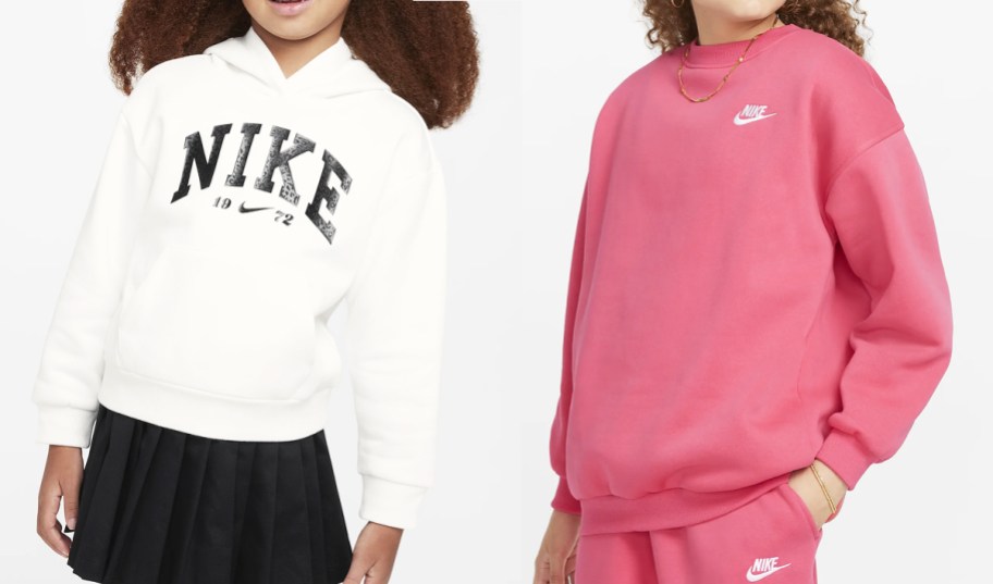 two girls in white and pink nike sweatshirts