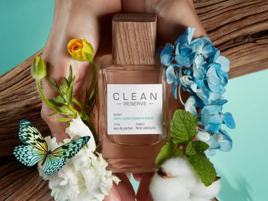 A Bottle of Clean reserve Warm Cotton perfume net to rawccotton and flowers