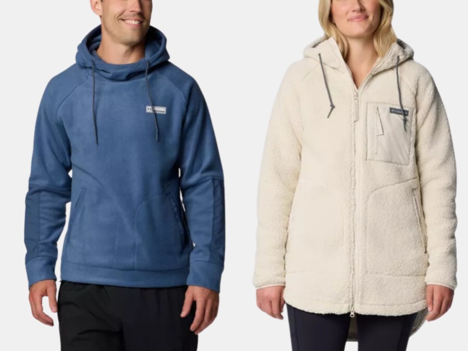 man wearing a blue Columbia hoodie and woman wearing a long cream color Columbia zip up hoodie