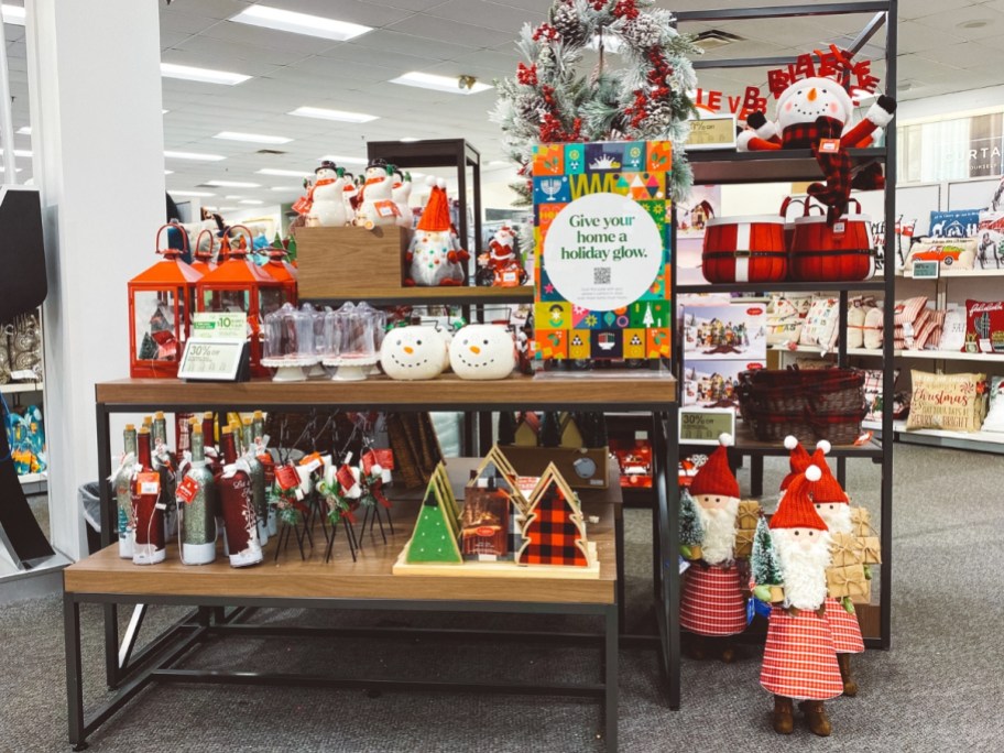 Christmas decor display in a Kohl's store with various tabletop decor pieces