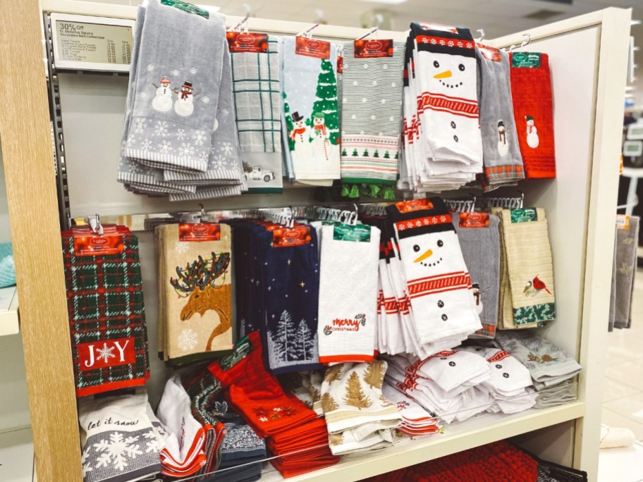 an aisle in Kohl's with Christmas kitchen tables and tablecloths