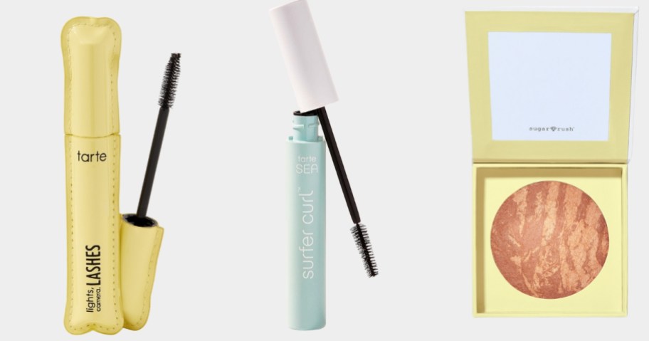 a yellow tube of Tarte Mascara, a light green and white tube of Tarte Mascara, and a gold open compact style Tarte bronzer