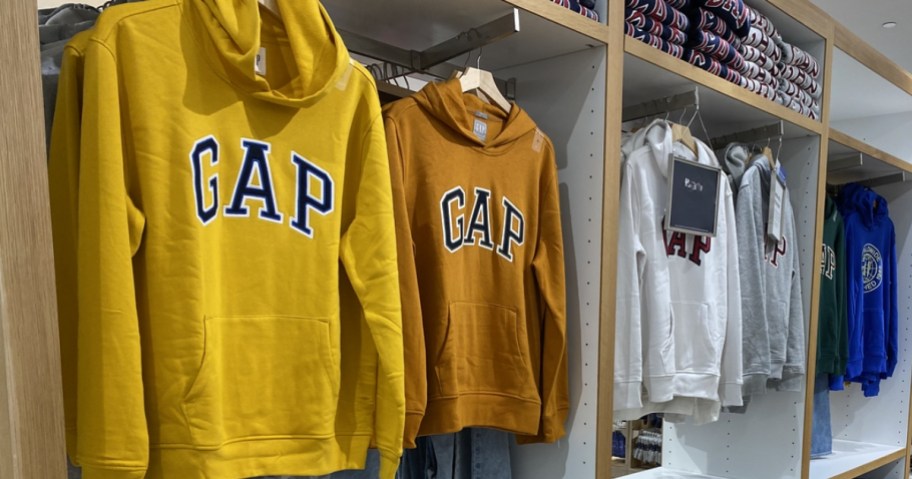 gap hoodies hanging in store