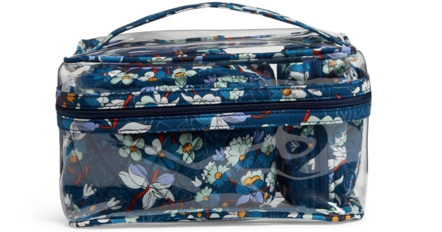 a clear and blue floral cosmetic case with additional floral cosmetic bags inside