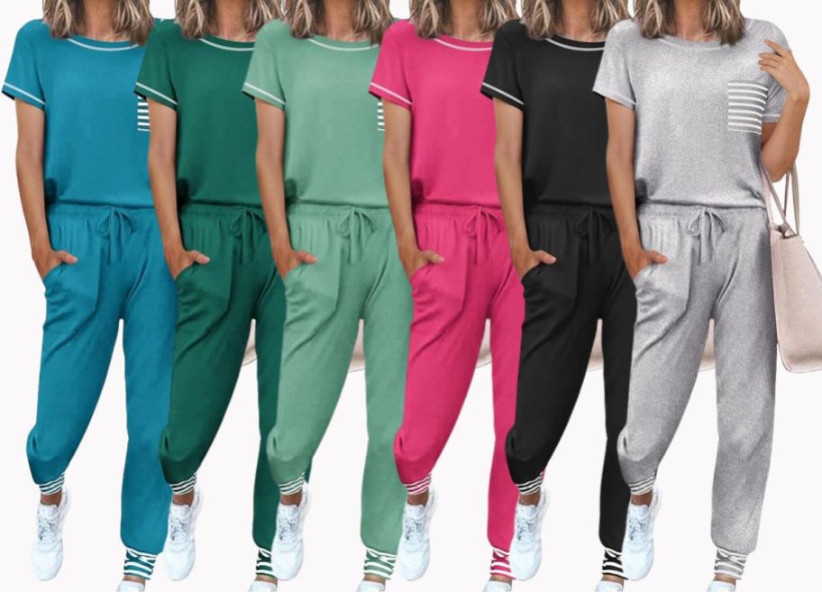 models in various colors of the same style of pajama sets stock image