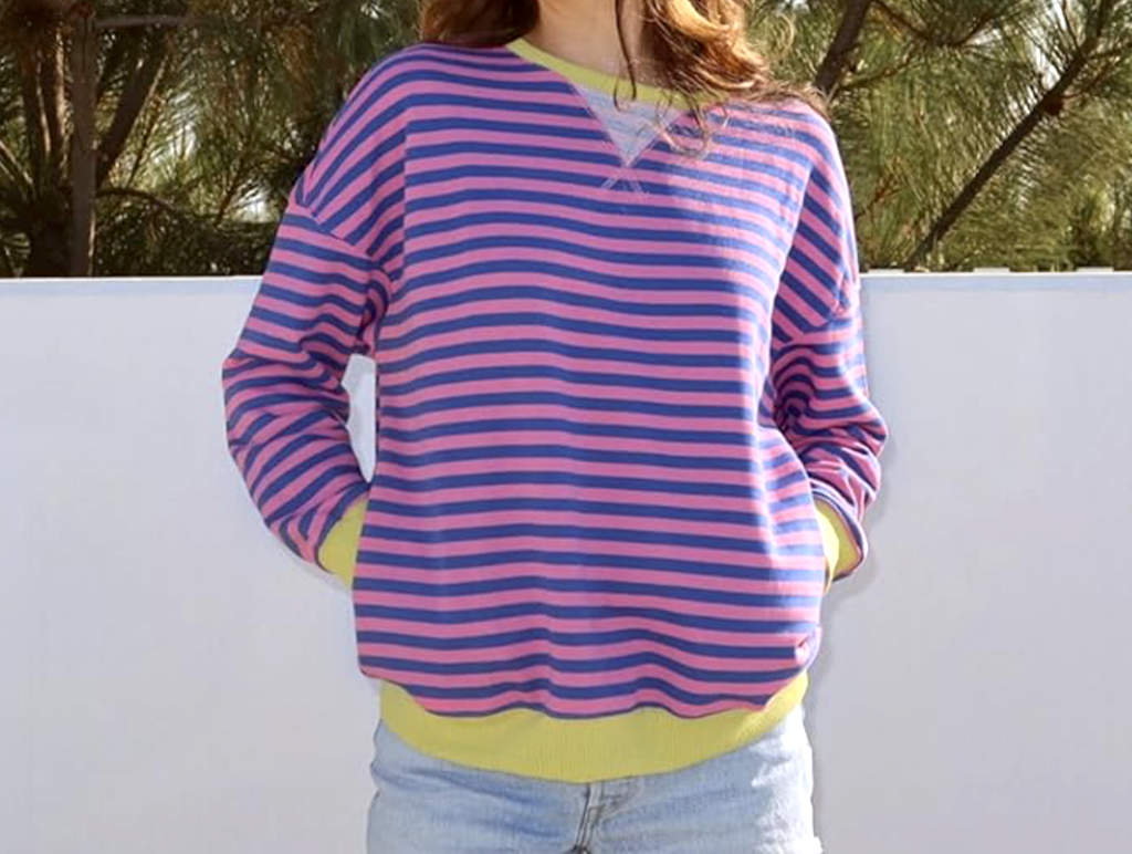 woman wearing oversized striped shirt