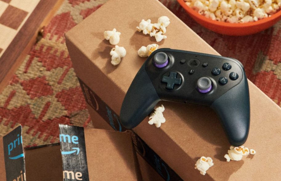 video game controller and popcorn on Amazon boxes