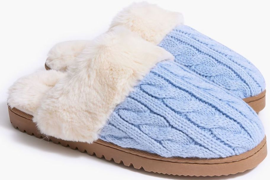 A pair of blue sweater clogs 