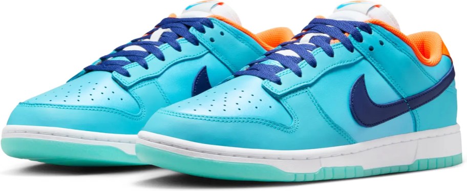 pair of bright blue, dark blue, and orange nike sneakers