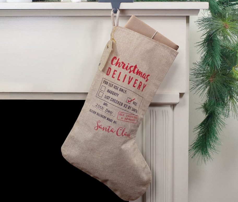 holiday stocking hanging infront of fireplace