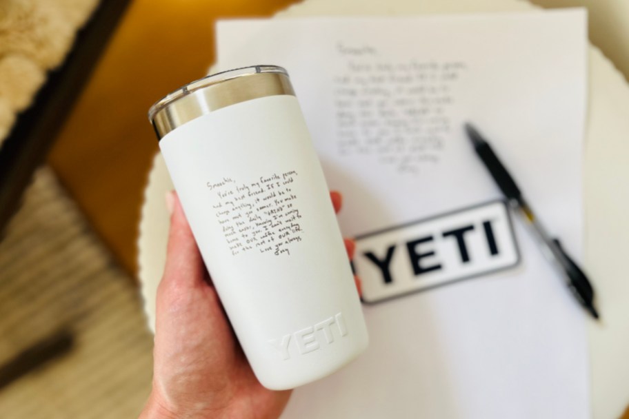 hand holding personalized YETI tumbler