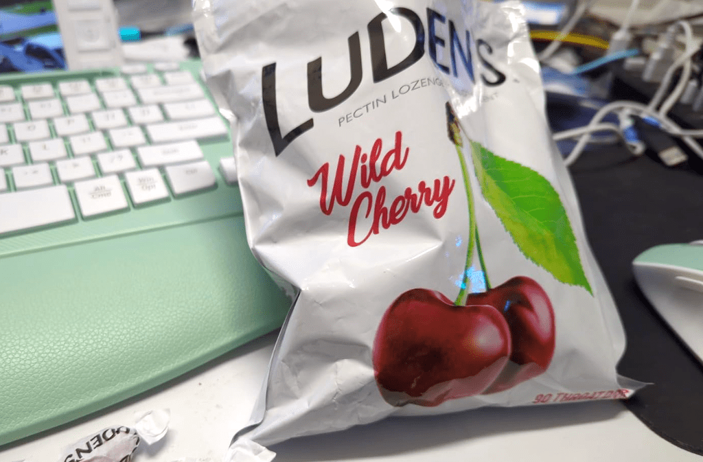 bag of cough drops leaning on keyboard