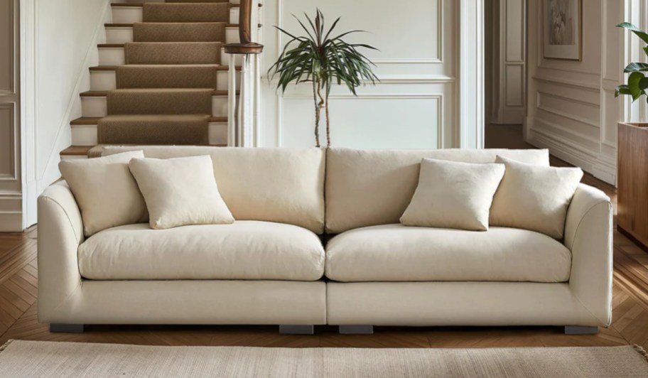 beige feathers loveseat