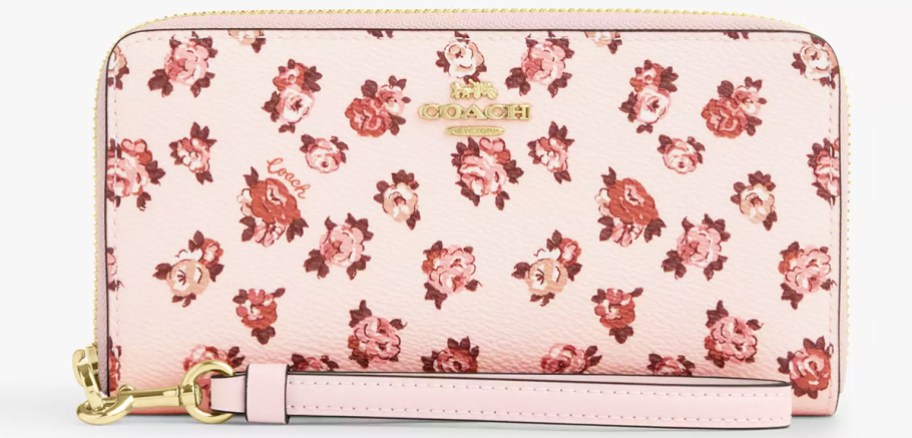 pink rose print coach wallet with wrist strap