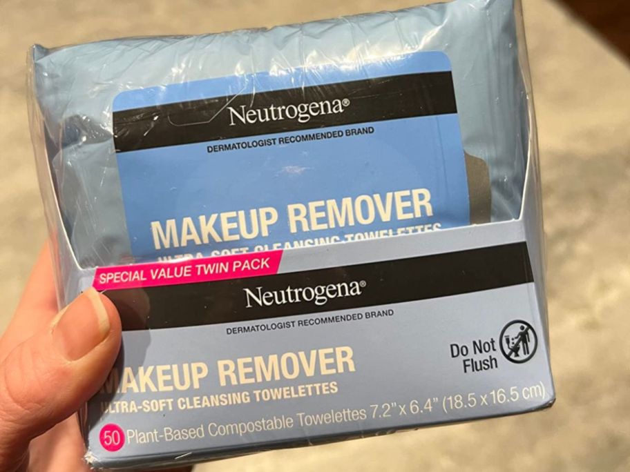 hand holding Neutrogena Makeup Remover Wipes 25-Count Twin Pack