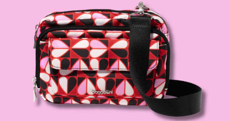 a crossbody bag with red, pink, black, and <a href='https://exquisica.com/58-matte-black-floor-lamp-with-white-linen-shade-contemporary-nordic-design' target='_blank' rel='follow'>white</a> hearts and a black strap” width=”912″ height=”479″></p>
<p>Through January 31st, head over to <a href=