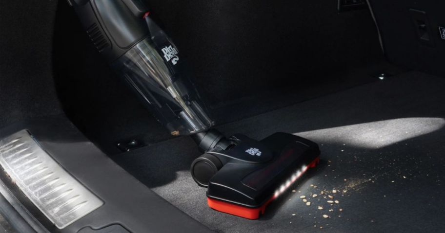 Dirt Devil 3-in-1 Lightweight Corded Stick Vacuum being used in car