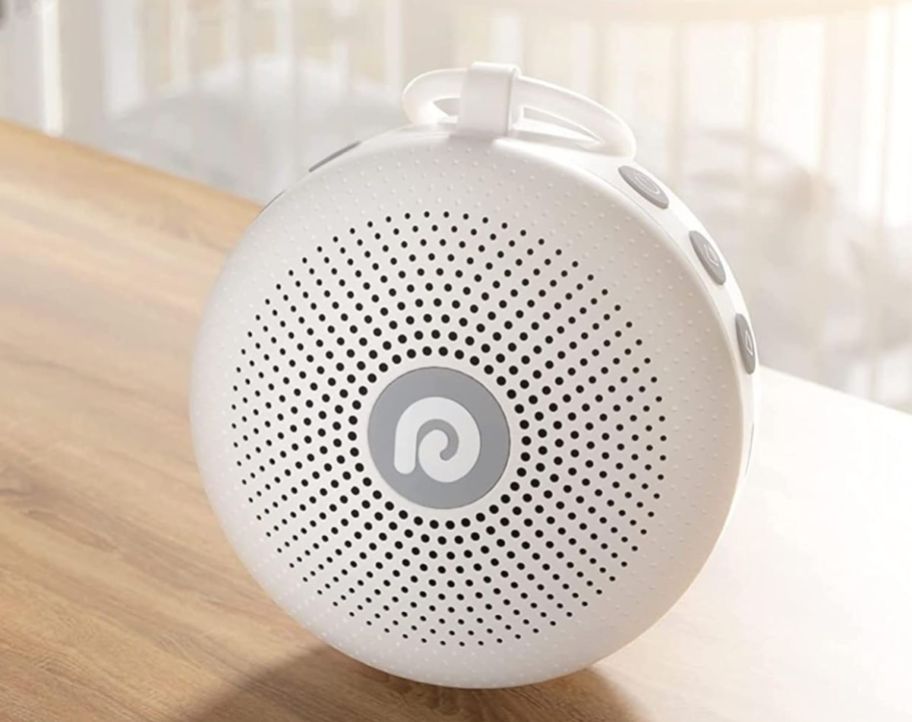 a dreamegg white noise machine sitting on a countertop