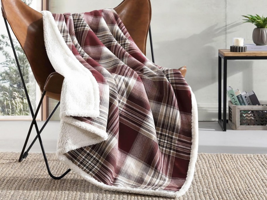 red plaid throw draped over a chair