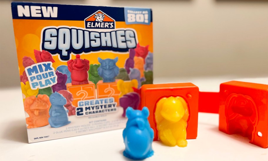 elmer's squishies box with two characters sitting in front of it in blue and yellow