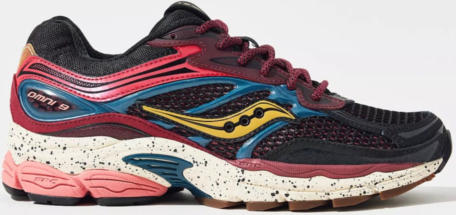 black, red, and yellow saucony sneakers 