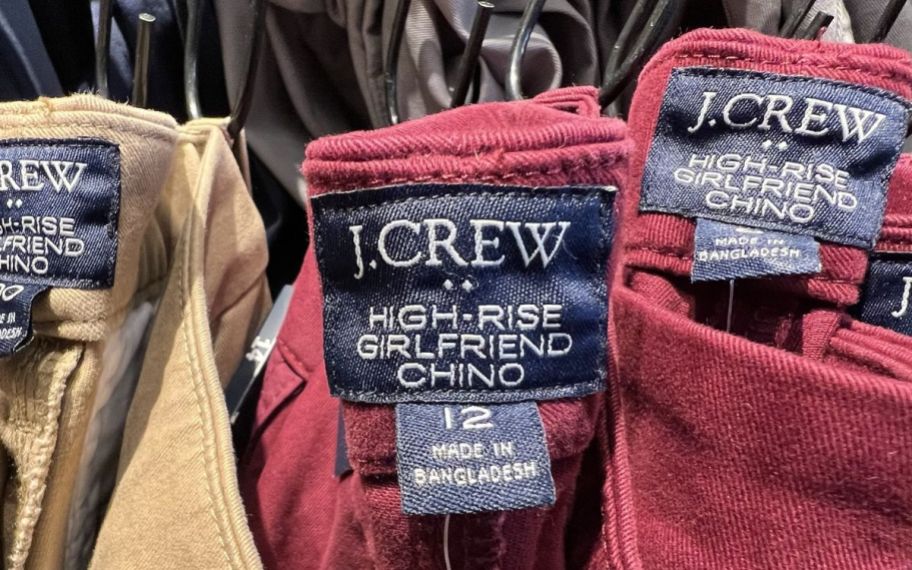 close up of j crew tags in pairs of pants