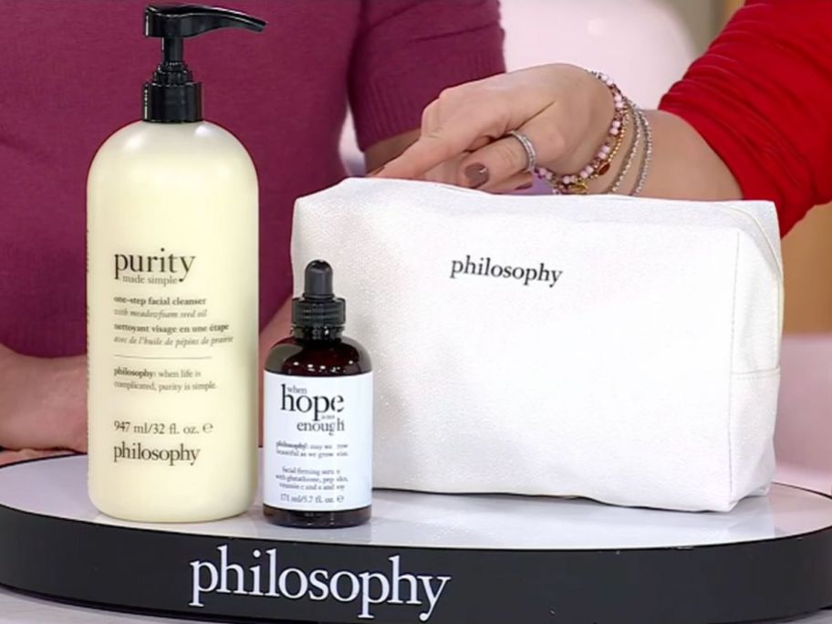 A huge bottle of Philosophy Cleanser, a large When Hope is Not Enough Serum and a toiletry bag