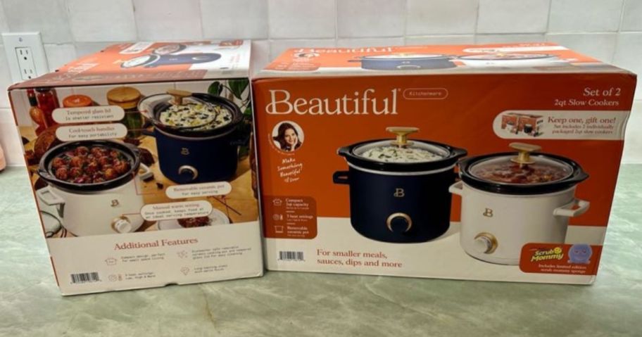 Beautiful 2-Quart Slow Cooker Set & Scrub Mommy 2-Pack box front and back showing on counter