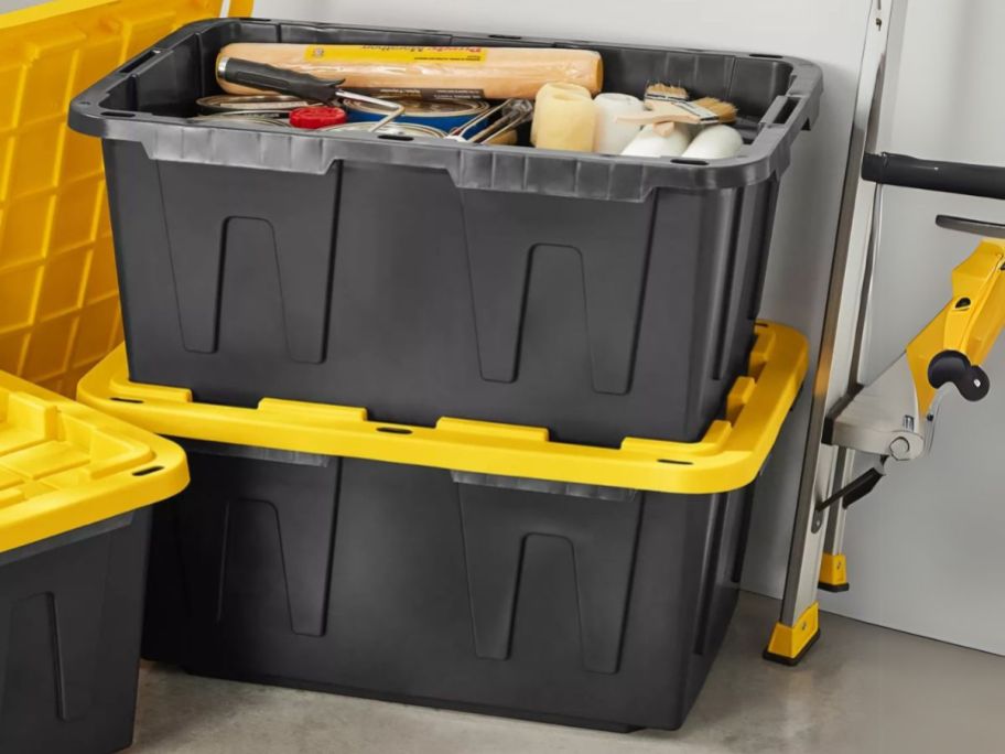 two Member's Mark 27-Gallon Heavy Duty Storage Totes stacked on top of each other