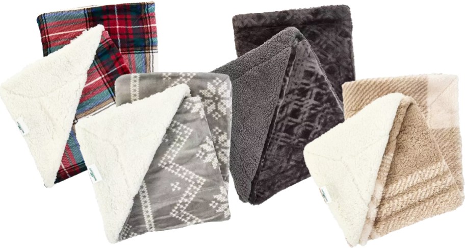 4 folded sherpa blankets in various prints