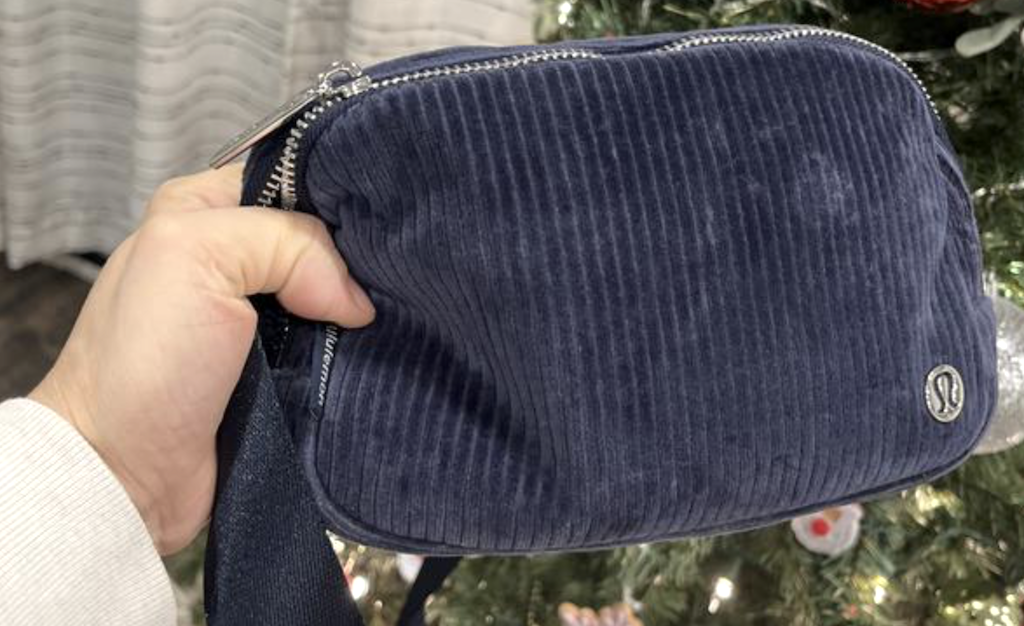 holding lululemon belt bag