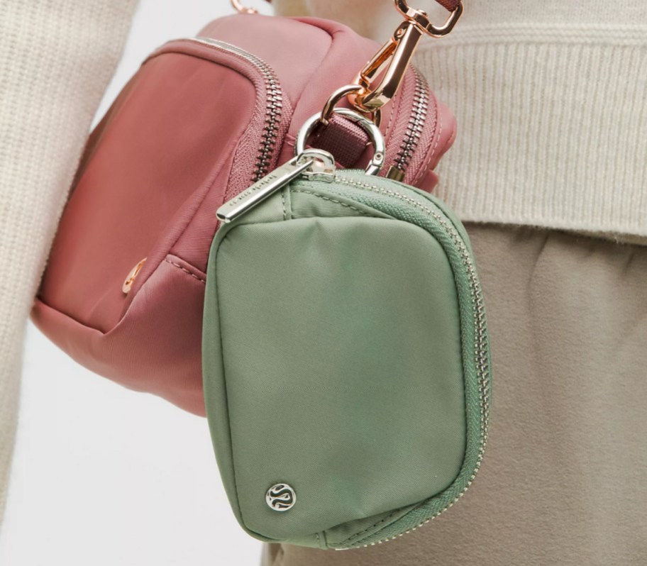 olive green nano belt bag on pink bag