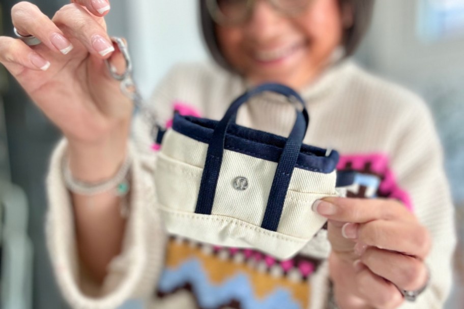 woman holding nano tote bag