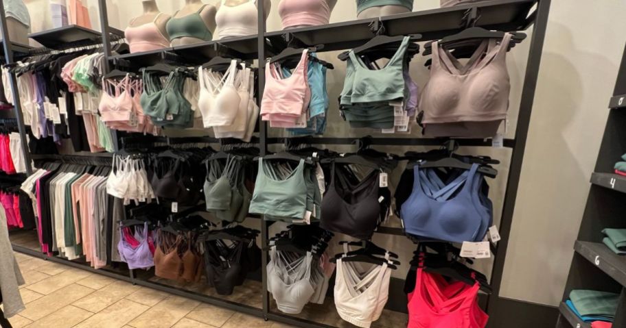 a wall of lululemon sports bras