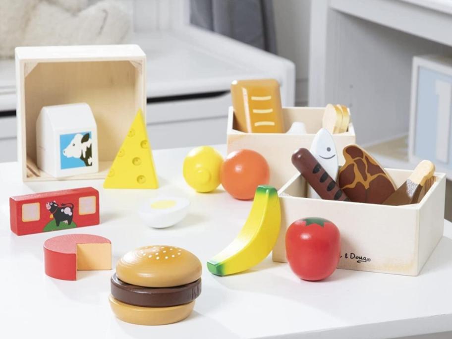 melissa and doug food groups play set with food out