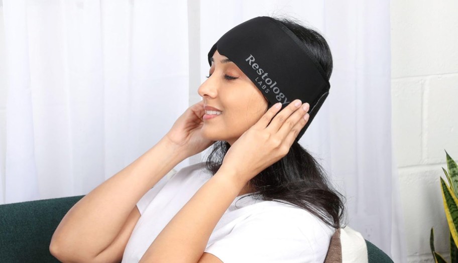 woman wearing a migraine cap 