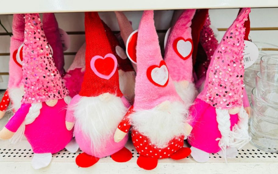 a assortment of valentines day gnomes on a store shelf