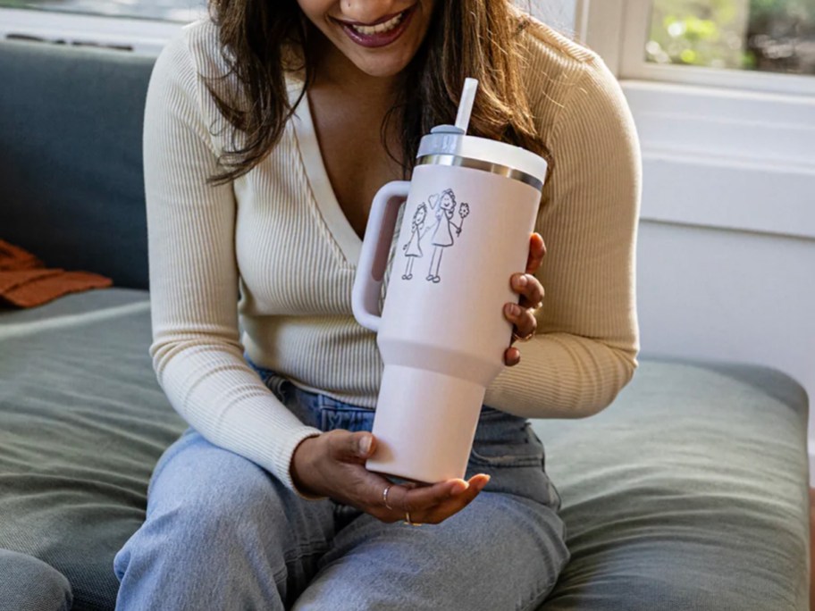 woman holding white personalized tumbler