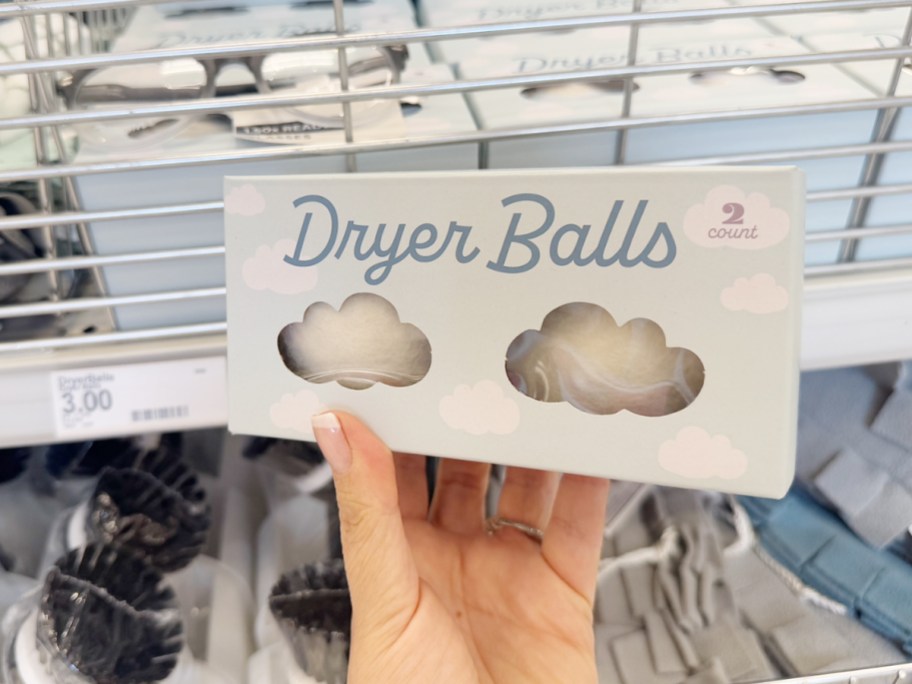 hand holding dryer balls box