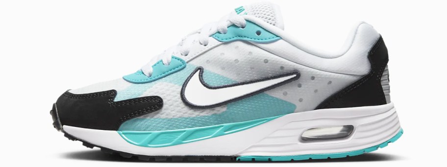 white, teal, and black nike sneaker