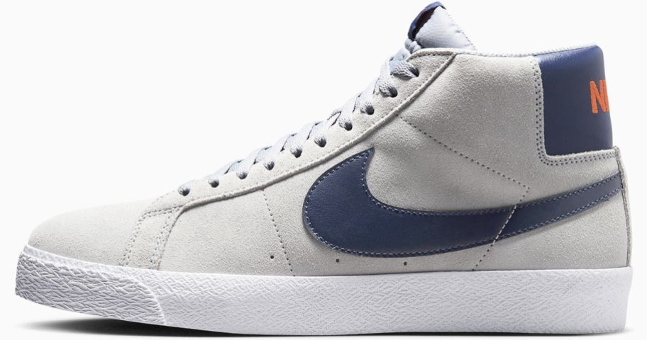 light grey and dark blue nike sneaker