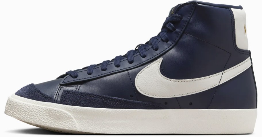 navy blue and white high top nike sneaker