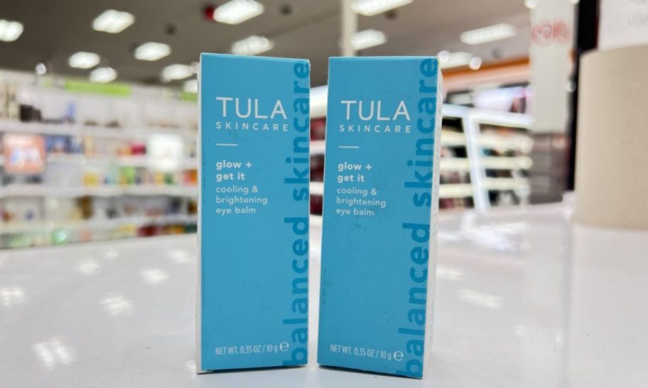 two boxes of tula eye balm on a store countertop