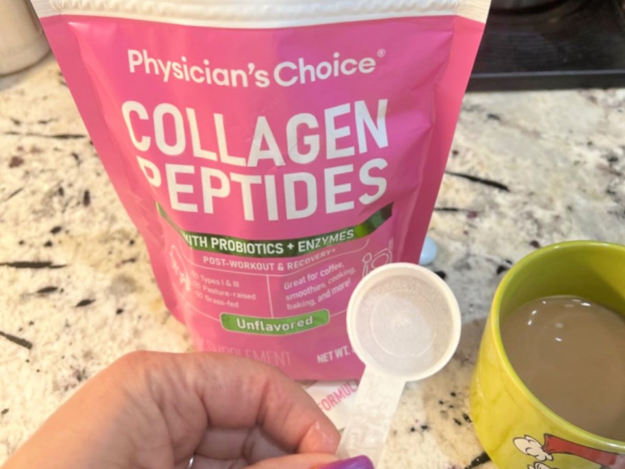 woman holding a scoop in front of a pink Physician’s Choice Collagen bag