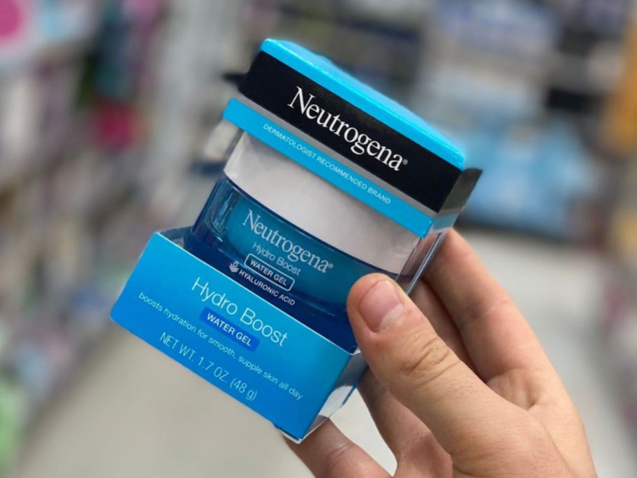 Hand holding a Neutrogena Hydro Boost Water Gel Moisturizer 1.7oz