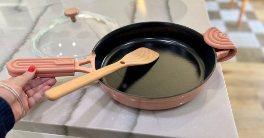 A counter with a Cast Iron Always Pan on it